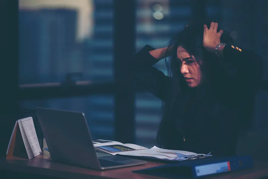 Stressed presenter preparing for an engaging and confident presentation, highlighting presentation anxiety.