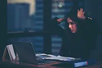 Stressed presenter preparing for an engaging and confident presentation, highlighting presentation anxiety.